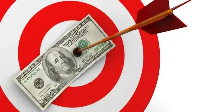 Money balanced on a dart, representing the payoff of justifying simulation for process improvement