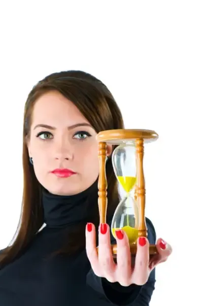 An hourglass, representing processing time